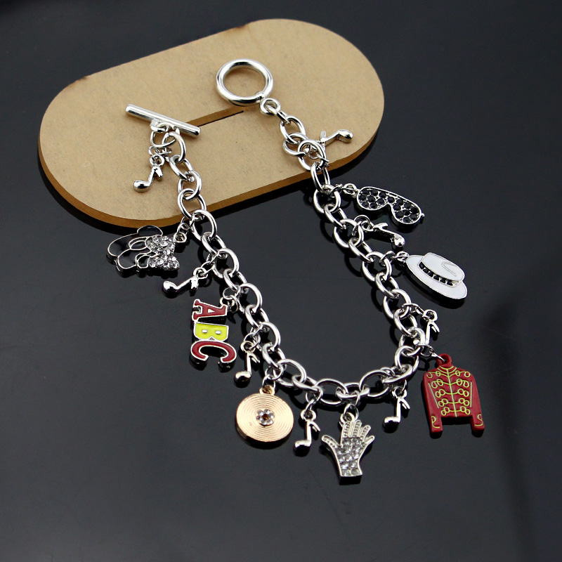 Michael Jackson Music Charm Br – Musical Instrument Jewelry recenzja i cena