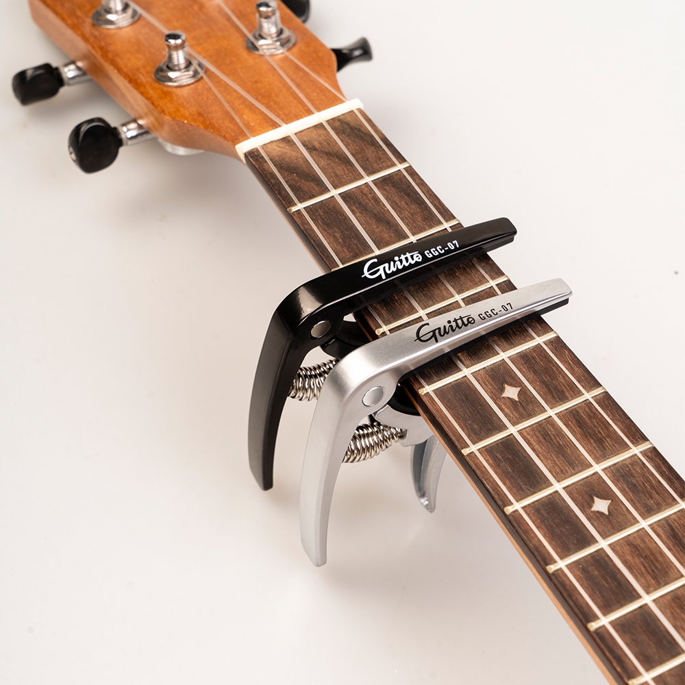 GUITTO GGC-07 Ukulele Capo Qui – Musical Instrument Organ recenzja i cena